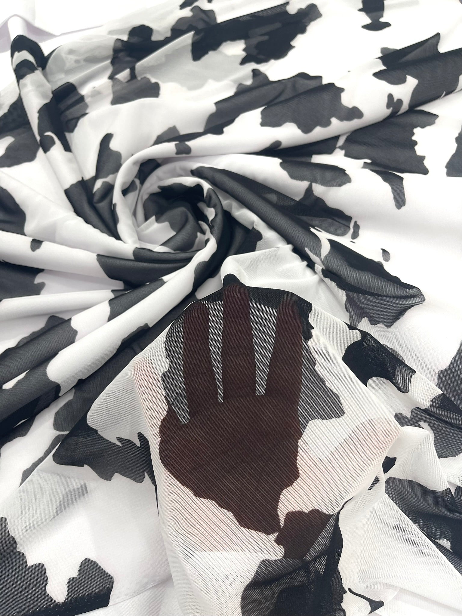 Cow Print 4 Way Stretch Power Mesh Nylon Sheer Fabric | 58 Inches Wide.