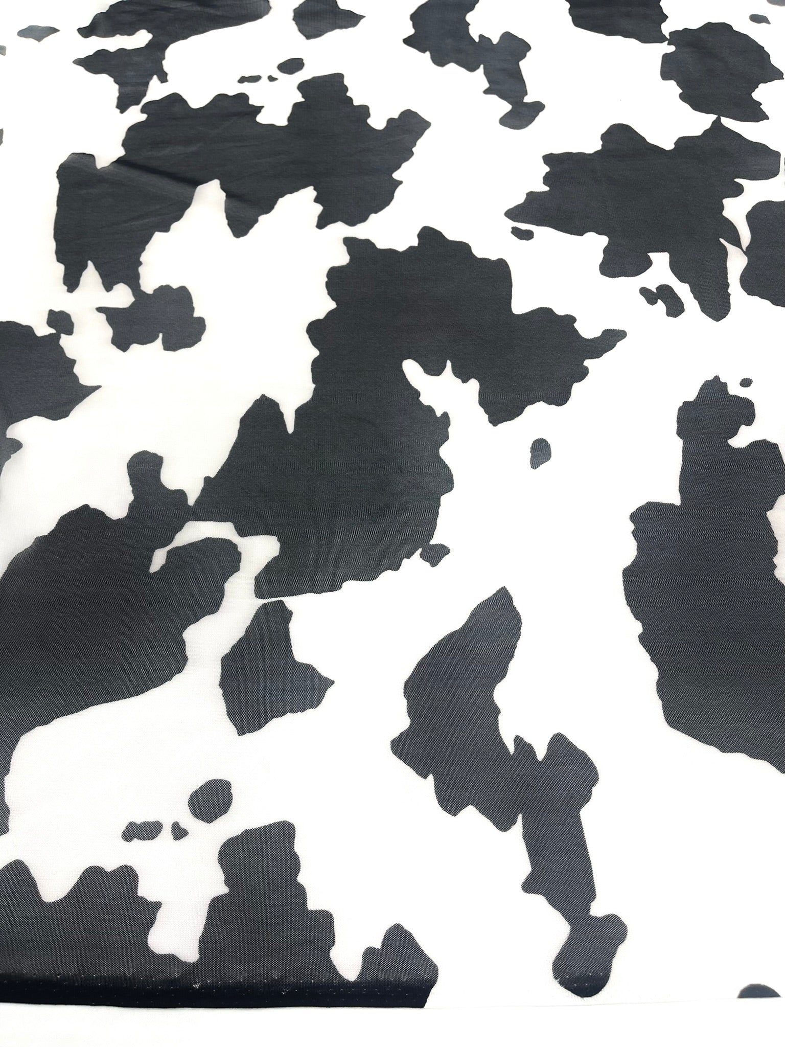 Cow Print 4 Way Stretch Power Mesh Nylon Sheer Fabric | 58 Inches Wide.