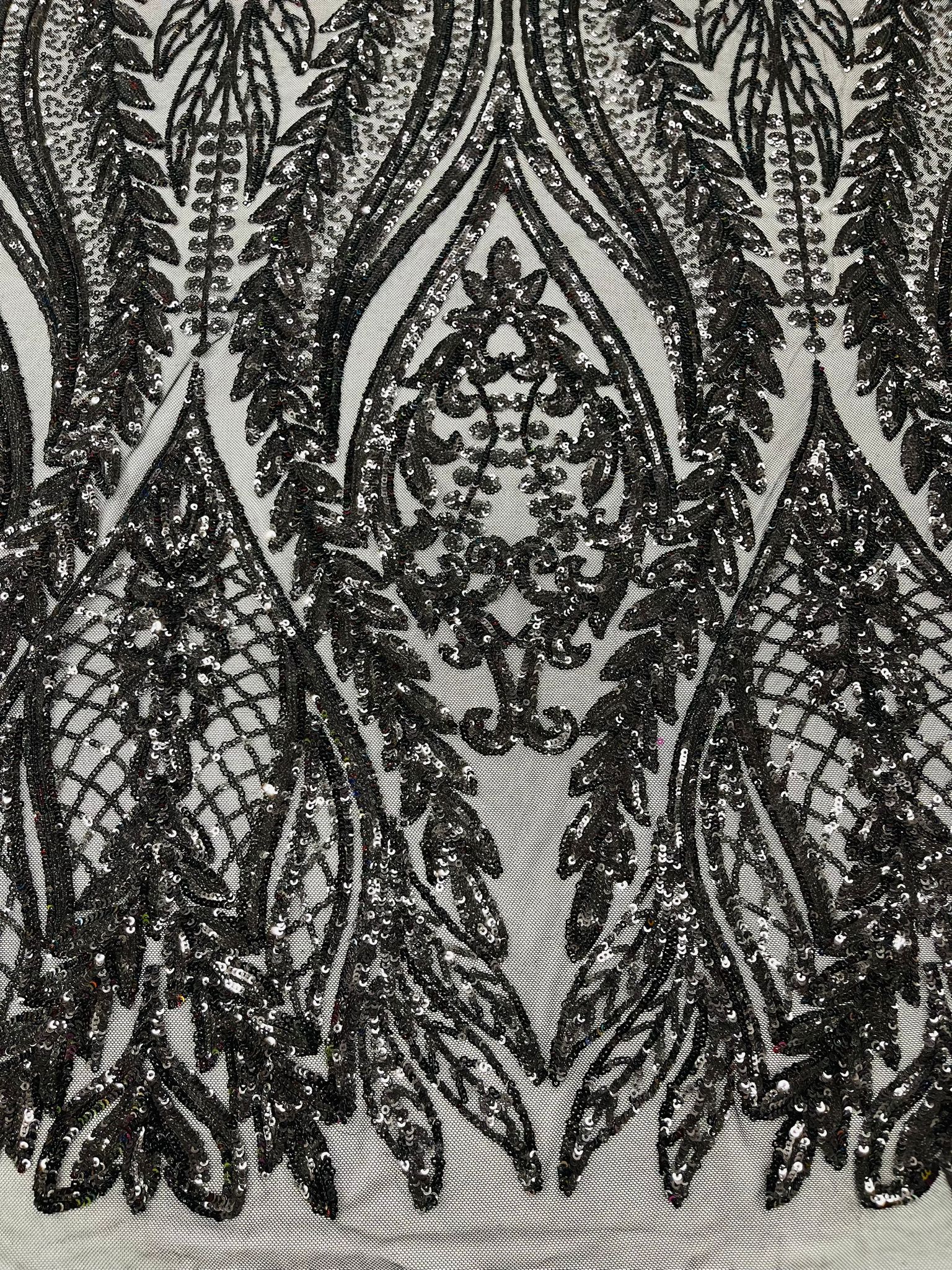 Damask design with sequins embroider on a 4 way stretch mesh fabric.