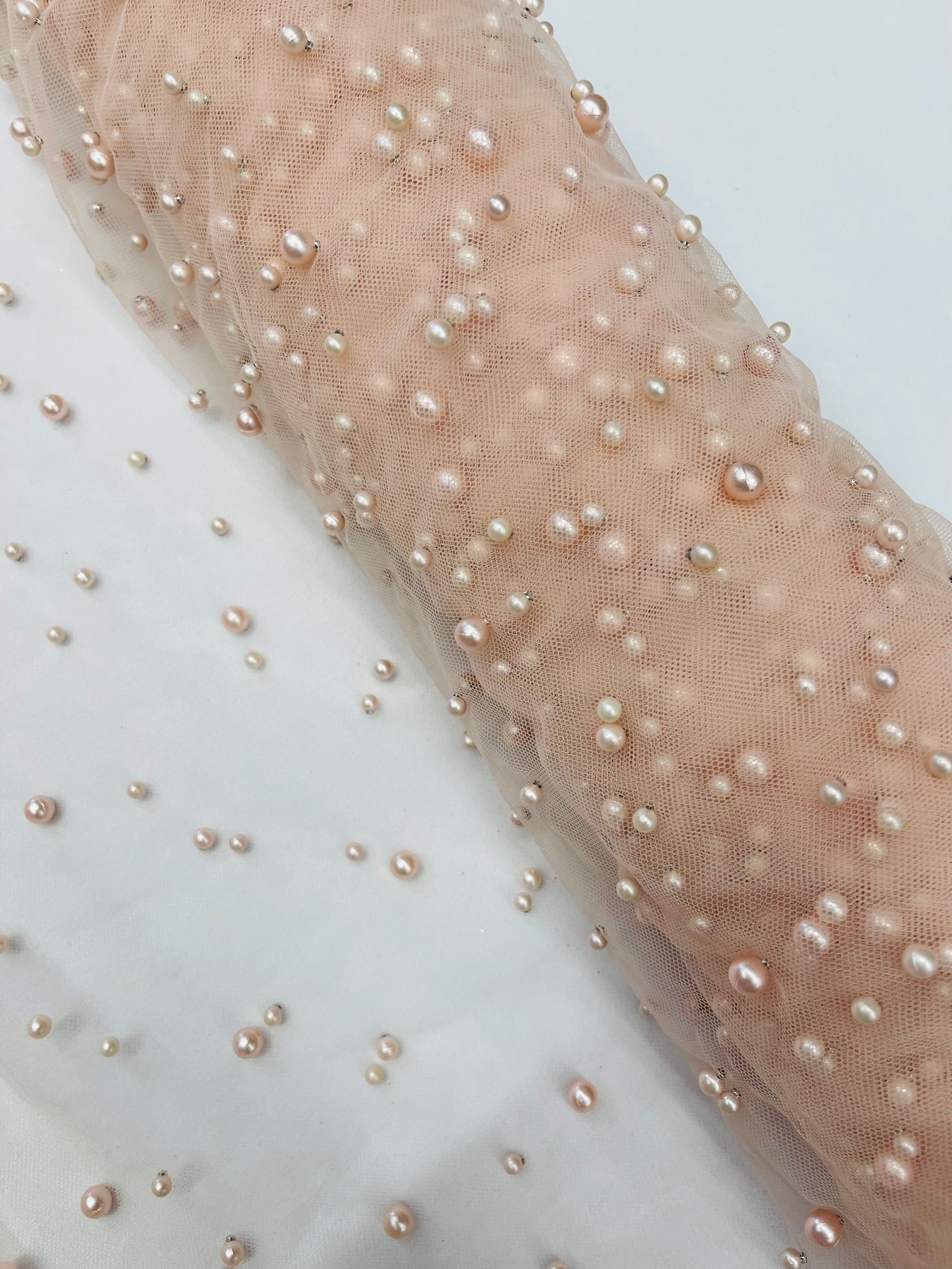 Scattered Pearls Studded Mesh, 2-Way Stretch, Sold by the yard.