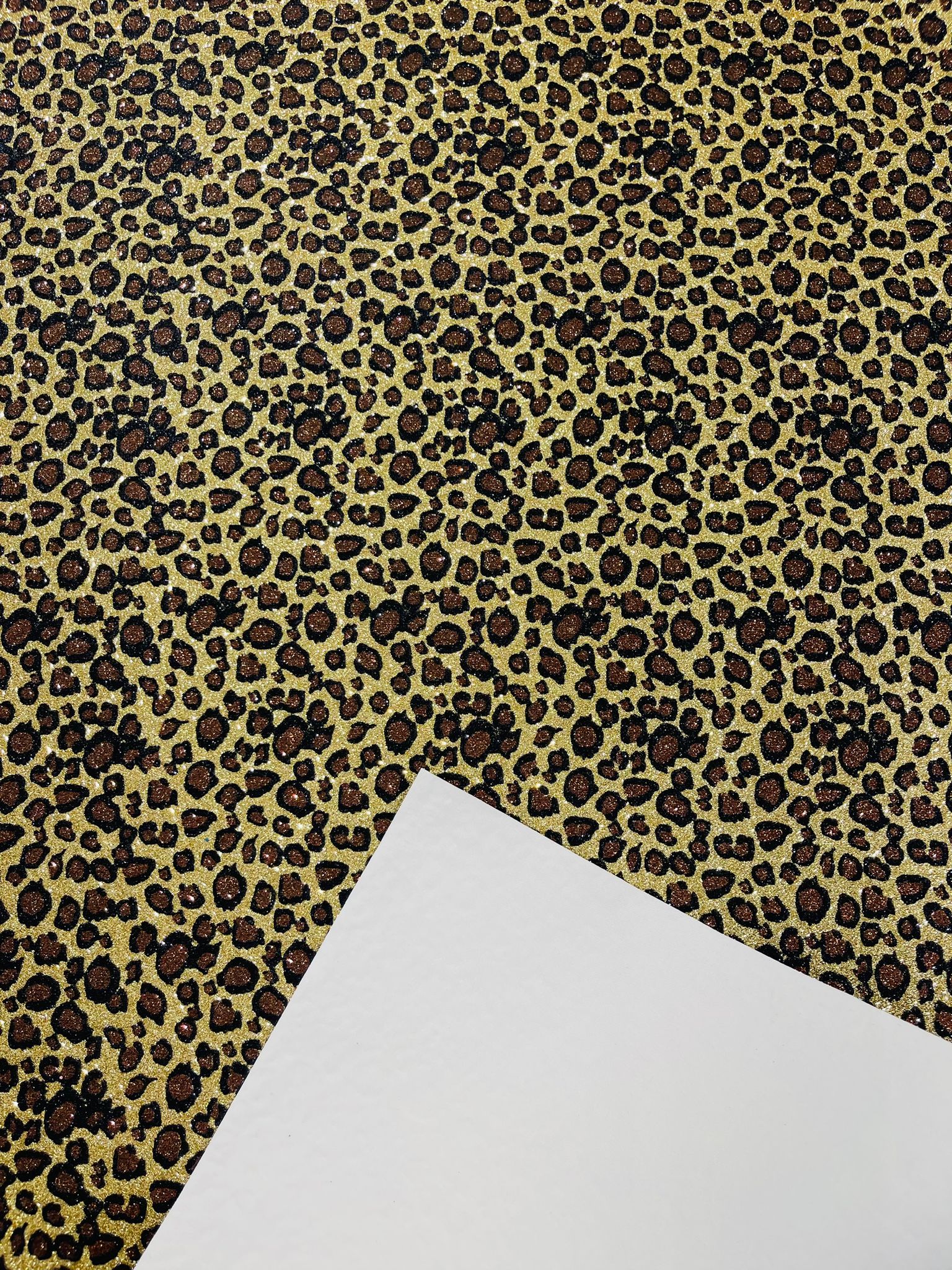 Leopard/ Chita glitter/Sparkle craft Upholstery On A Canvas Backing/Faux vinyl/48” wide.