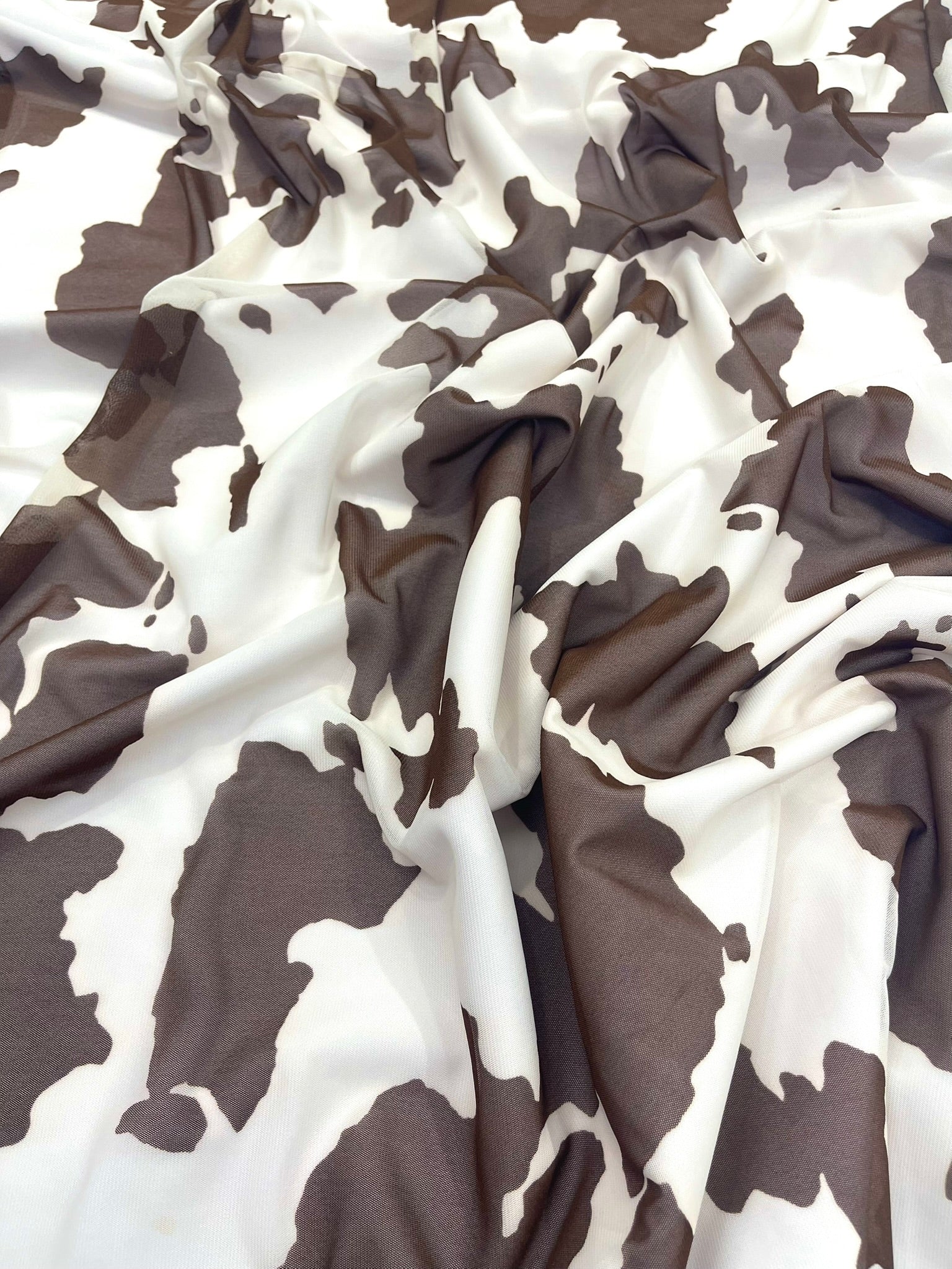 Cow Print 4 Way Stretch Power Mesh Nylon Sheer Fabric | 58 Inches Wide.