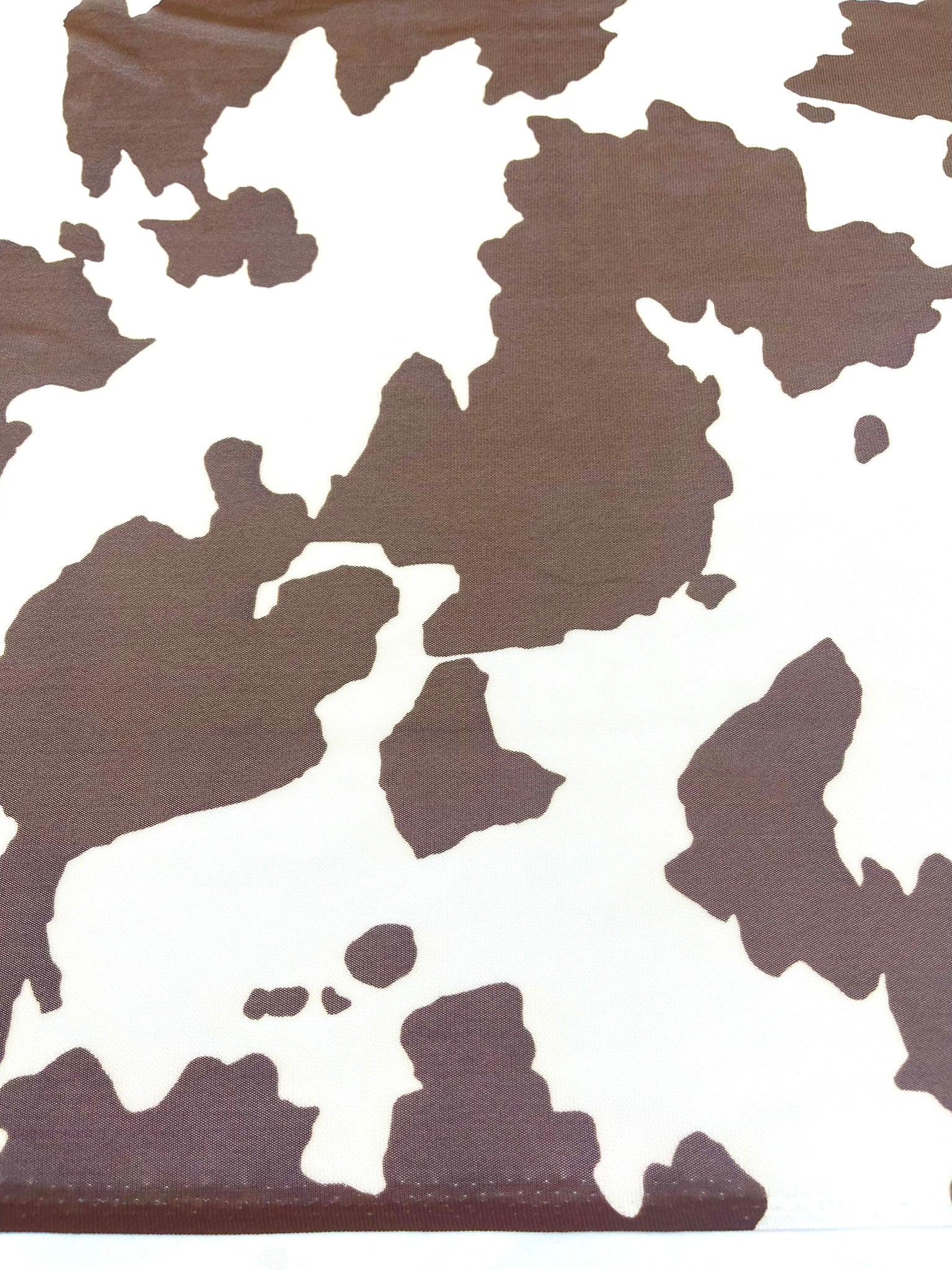 Cow Print 4 Way Stretch Power Mesh Nylon Sheer Fabric | 58 Inches Wide.