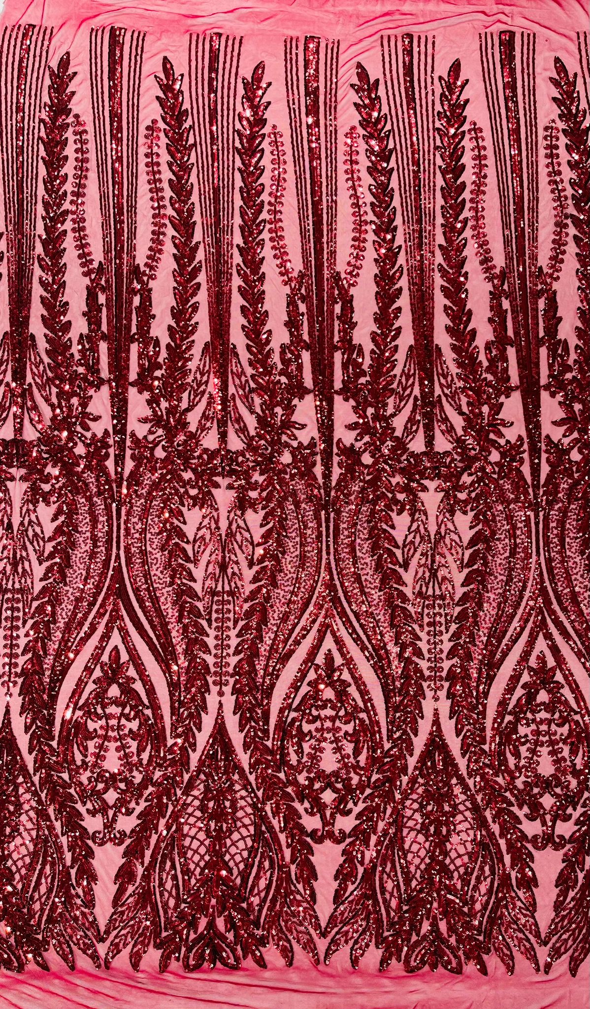 Damask design with sequins embroider on a 4 way stretch mesh fabric.