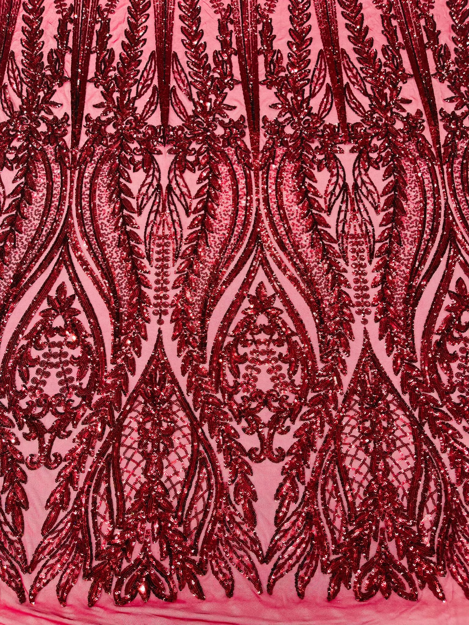 Damask design with sequins embroider on a 4 way stretch mesh fabric.