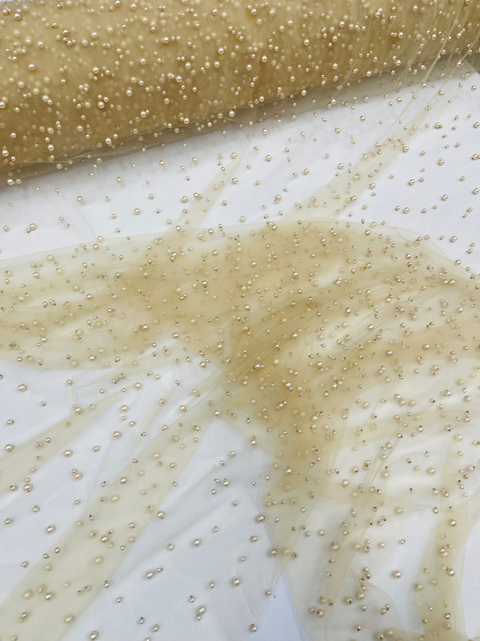 Scattered Pearls Studded Mesh, 2-Way Stretch, Sold by the yard.
