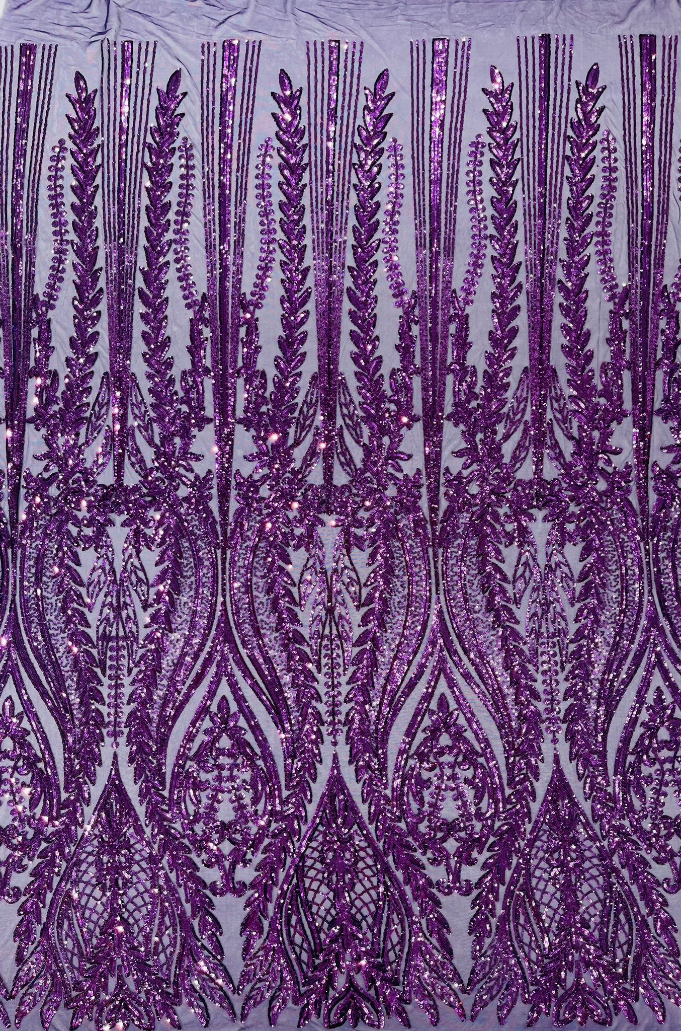 Damask design with sequins embroider on a 4 way stretch mesh fabric.