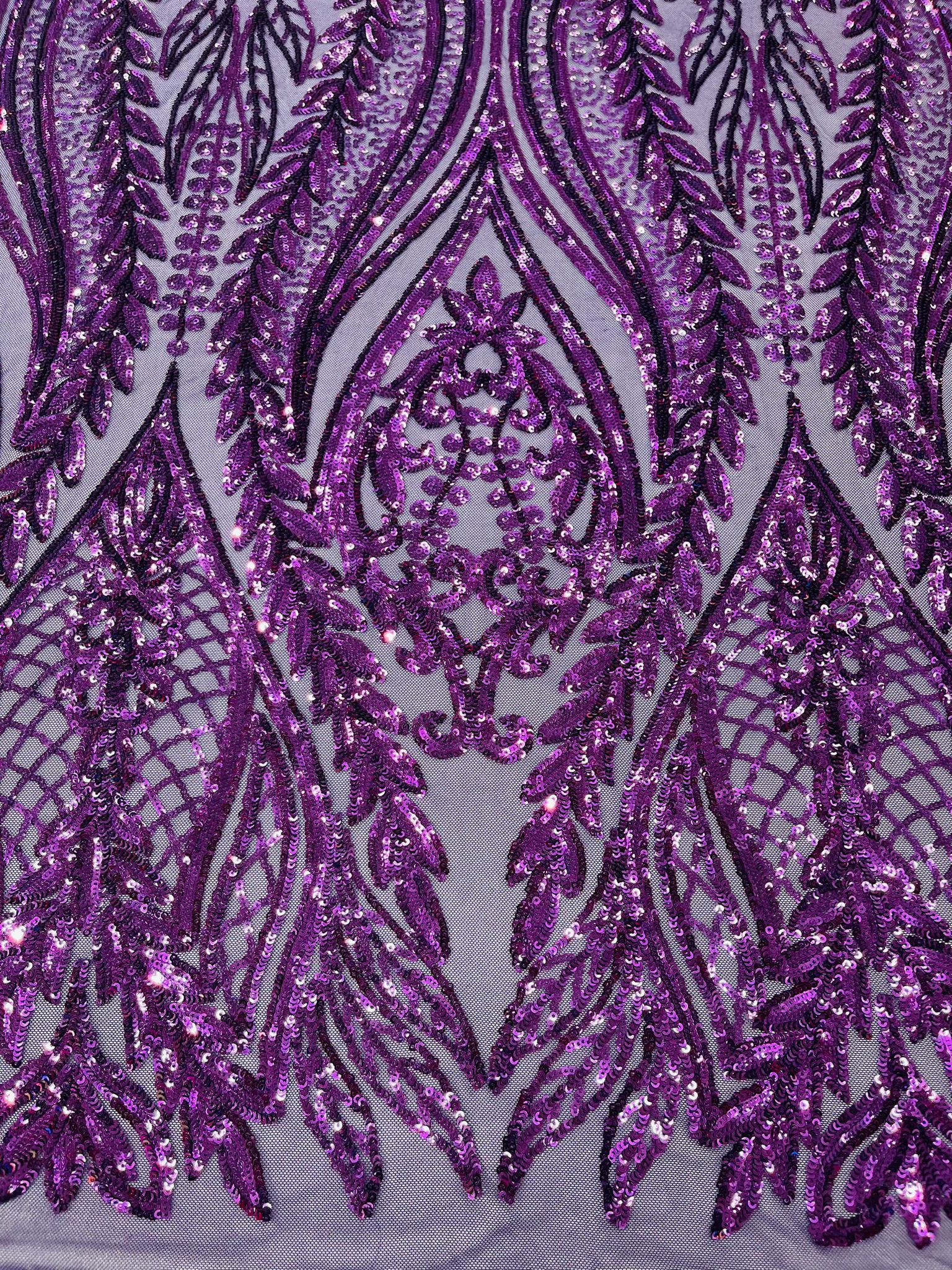 Damask design with sequins embroider on a 4 way stretch mesh fabric.