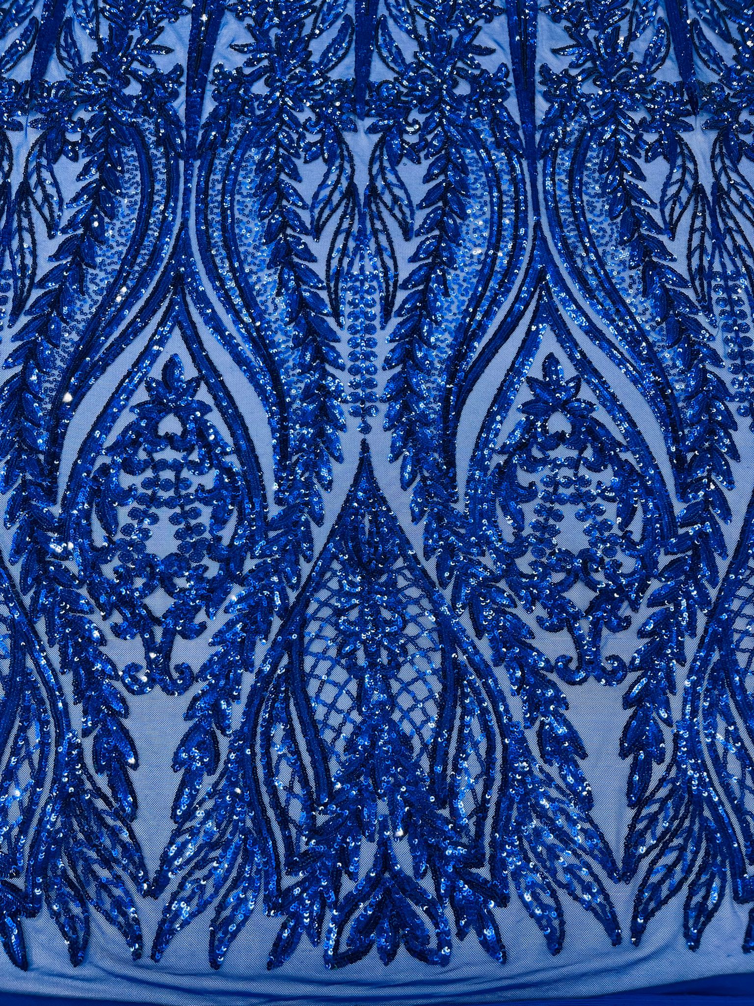 Damask design with sequins embroider on a 4 way stretch mesh fabric.