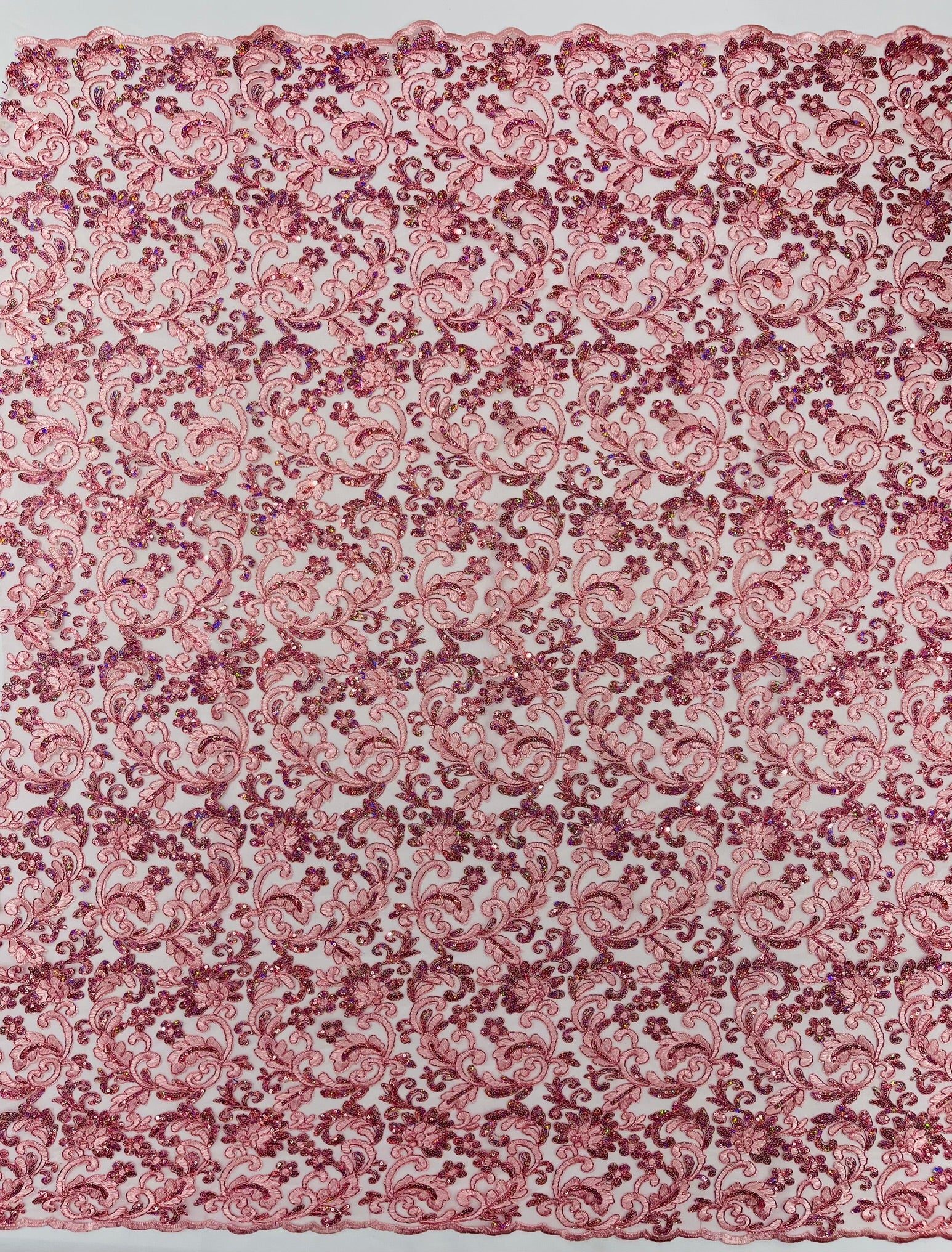 Metallic Corded Lace Design Embroidered With Holographic Sequins on a Mesh 54” Wide.