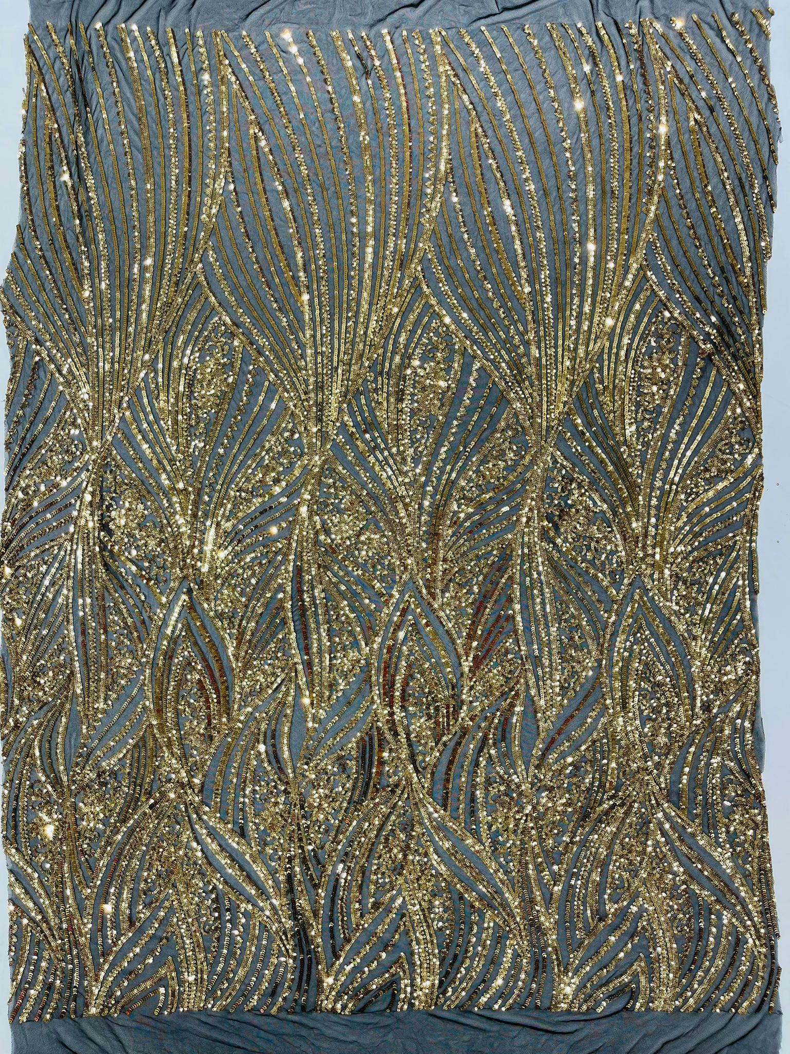 Geometric Feather wing shiny sequin design on a 4 way stretch mesh Fabric-prom-sold by the yard.