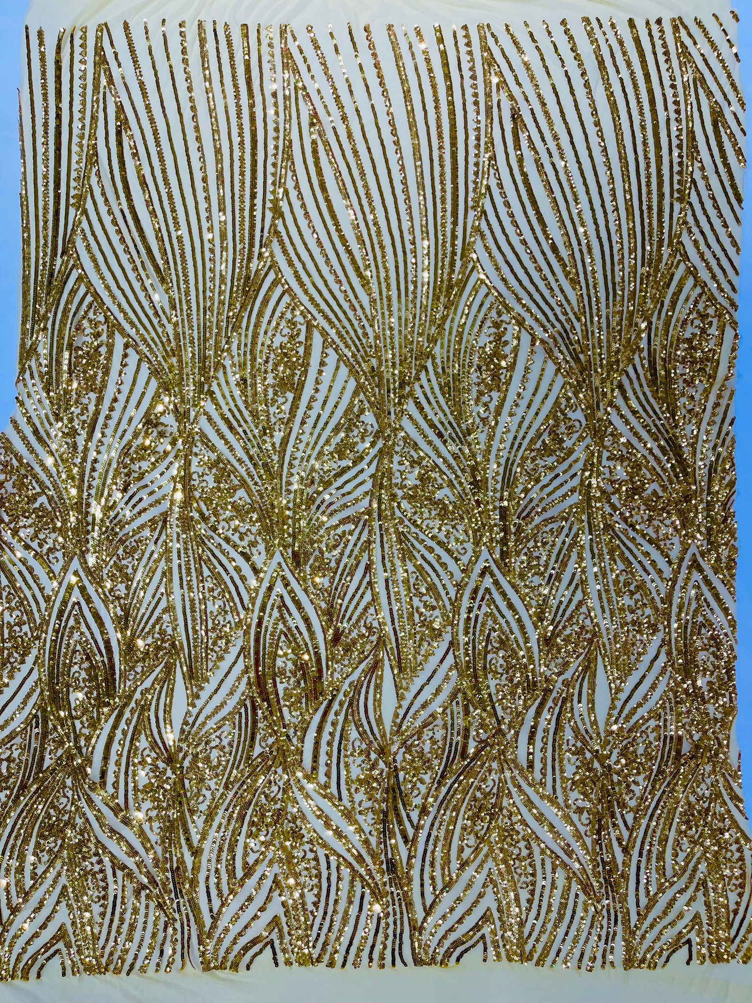 Geometric Feather wing shiny sequin design on a 4 way stretch mesh Fabric-prom-sold by the yard.