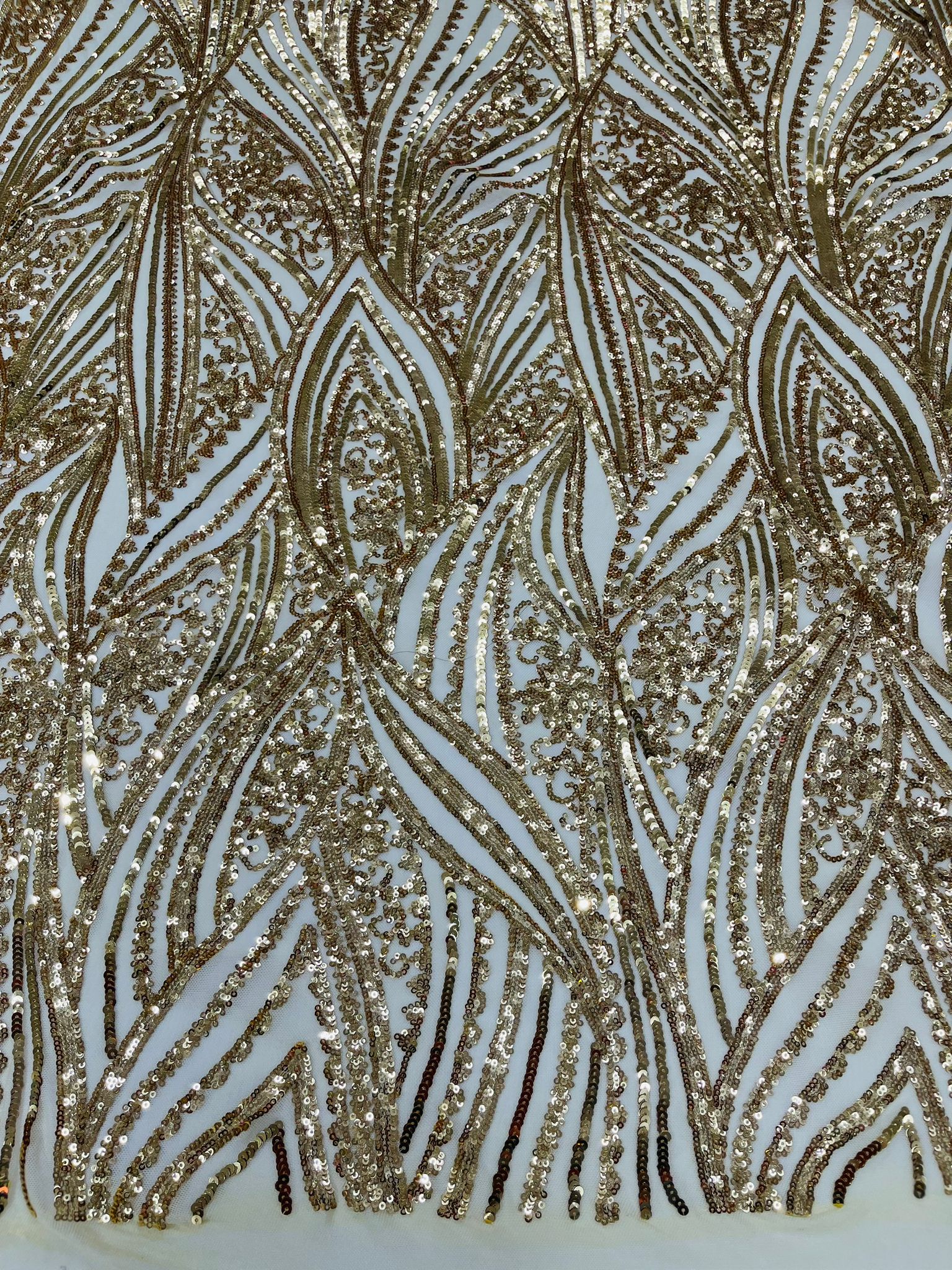 Geometric Feather wing shiny sequin design on a 4 way stretch mesh Fabric-prom-sold by the yard.