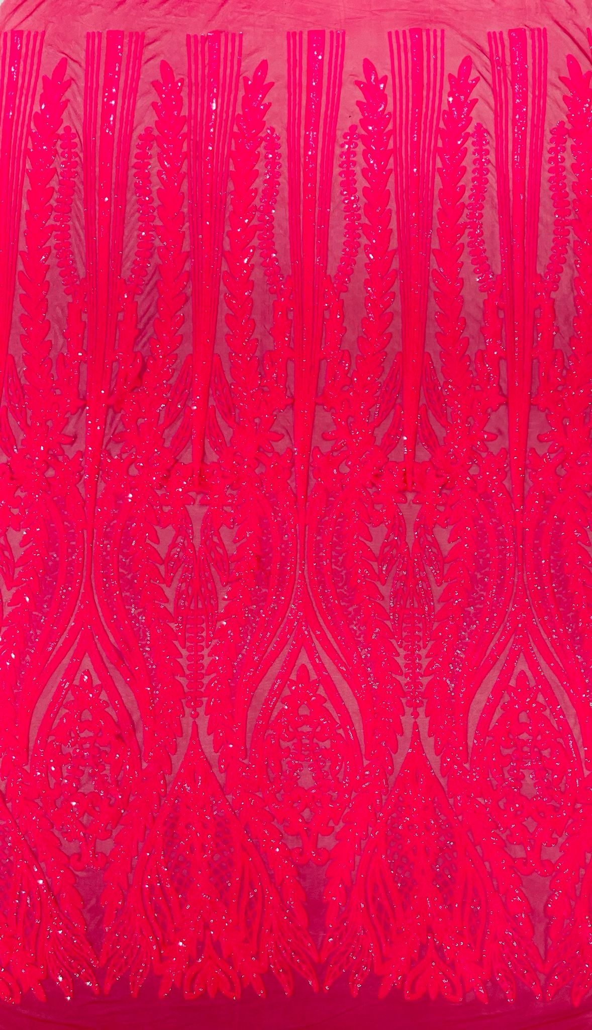 Damask design with sequins embroider on a 4 way stretch mesh fabric.