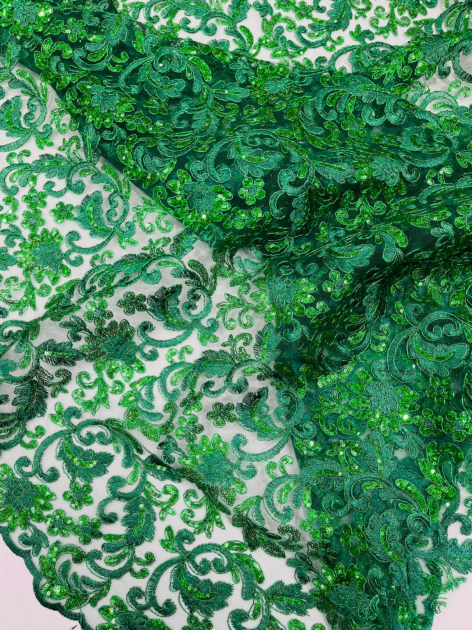 Metallic Corded Lace Design Embroidered With Holographic Sequins on a Mesh 54” Wide.