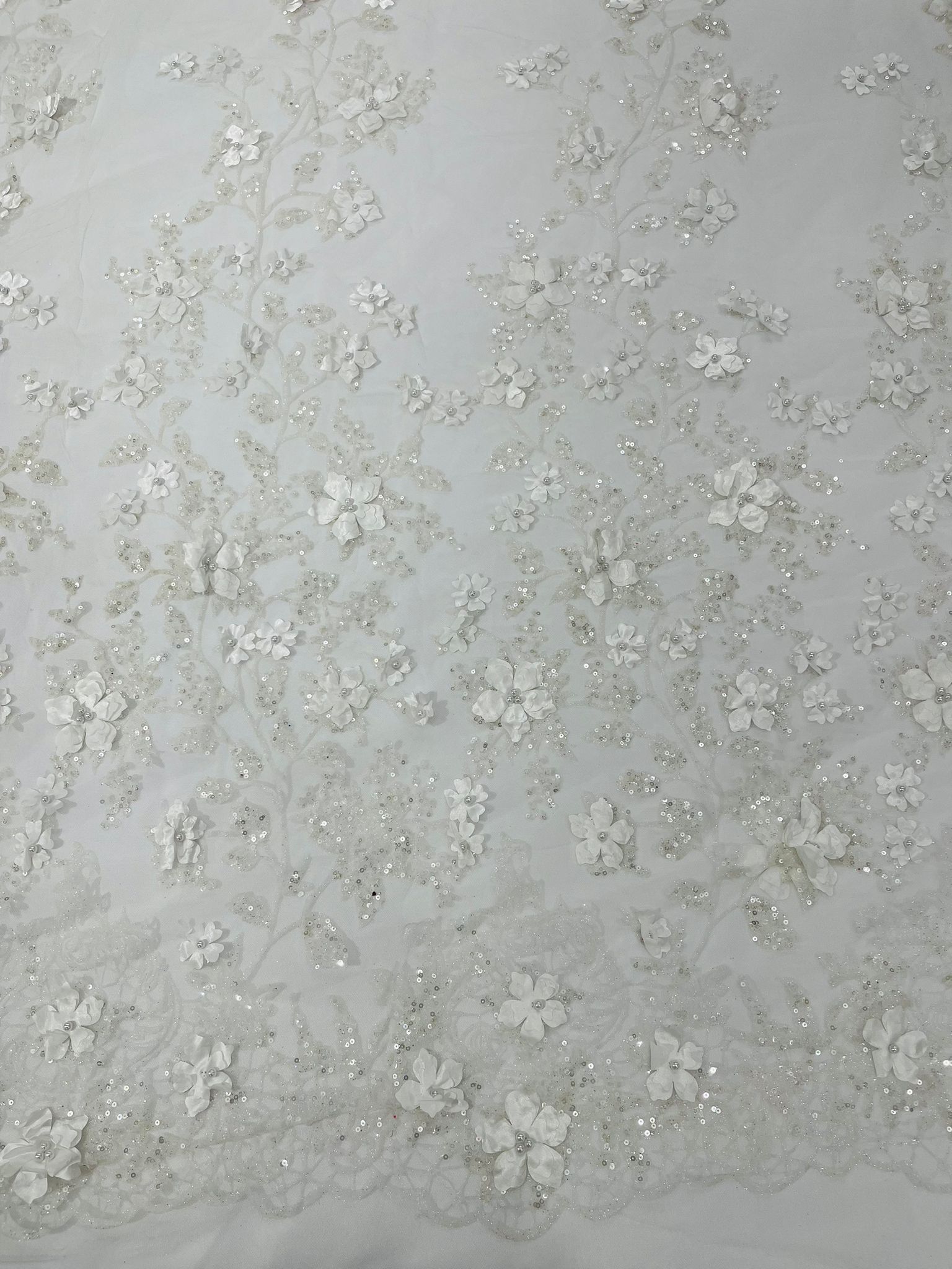 Princess Glitter 3d floral design embroidery with pearls in a mesh lace-sold by the yard.