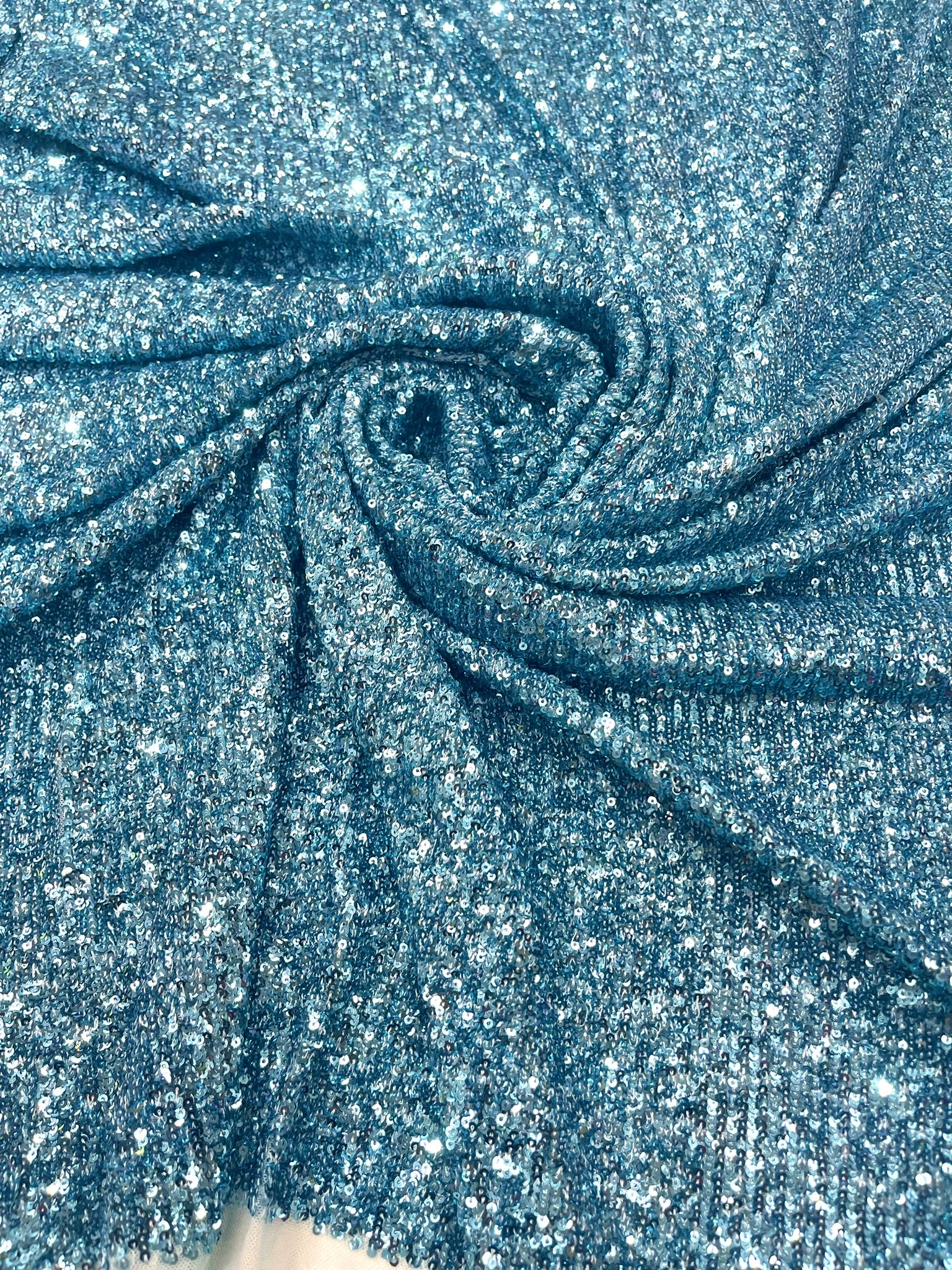 Chain shiny clear sequins design on a 4 way stretch mesh fabric -Sold by the yard.
