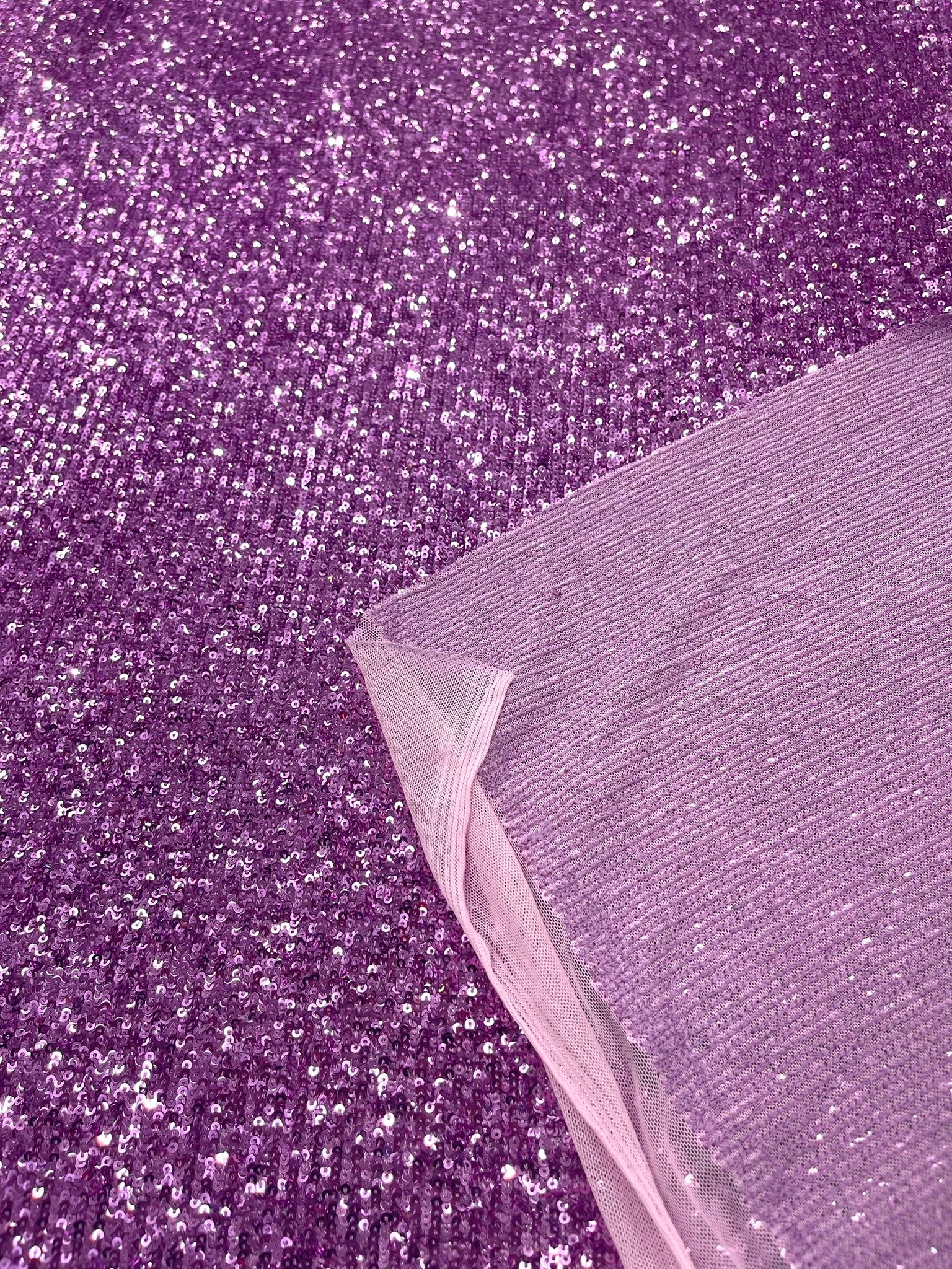 Chain shiny clear sequins design on a 4 way stretch mesh fabric -Sold by the yard.