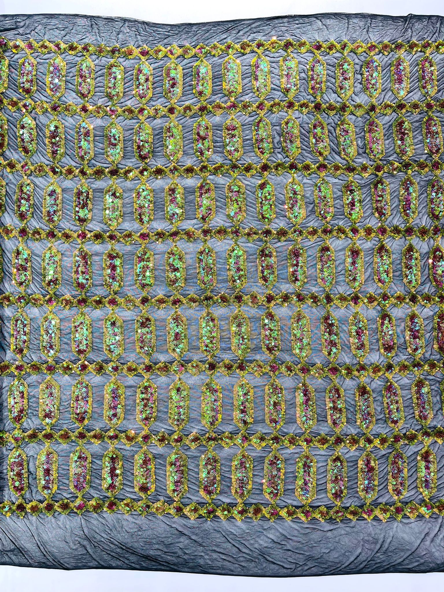 Jewel sequin design on a Cream 4 way stretch mesh fabric.