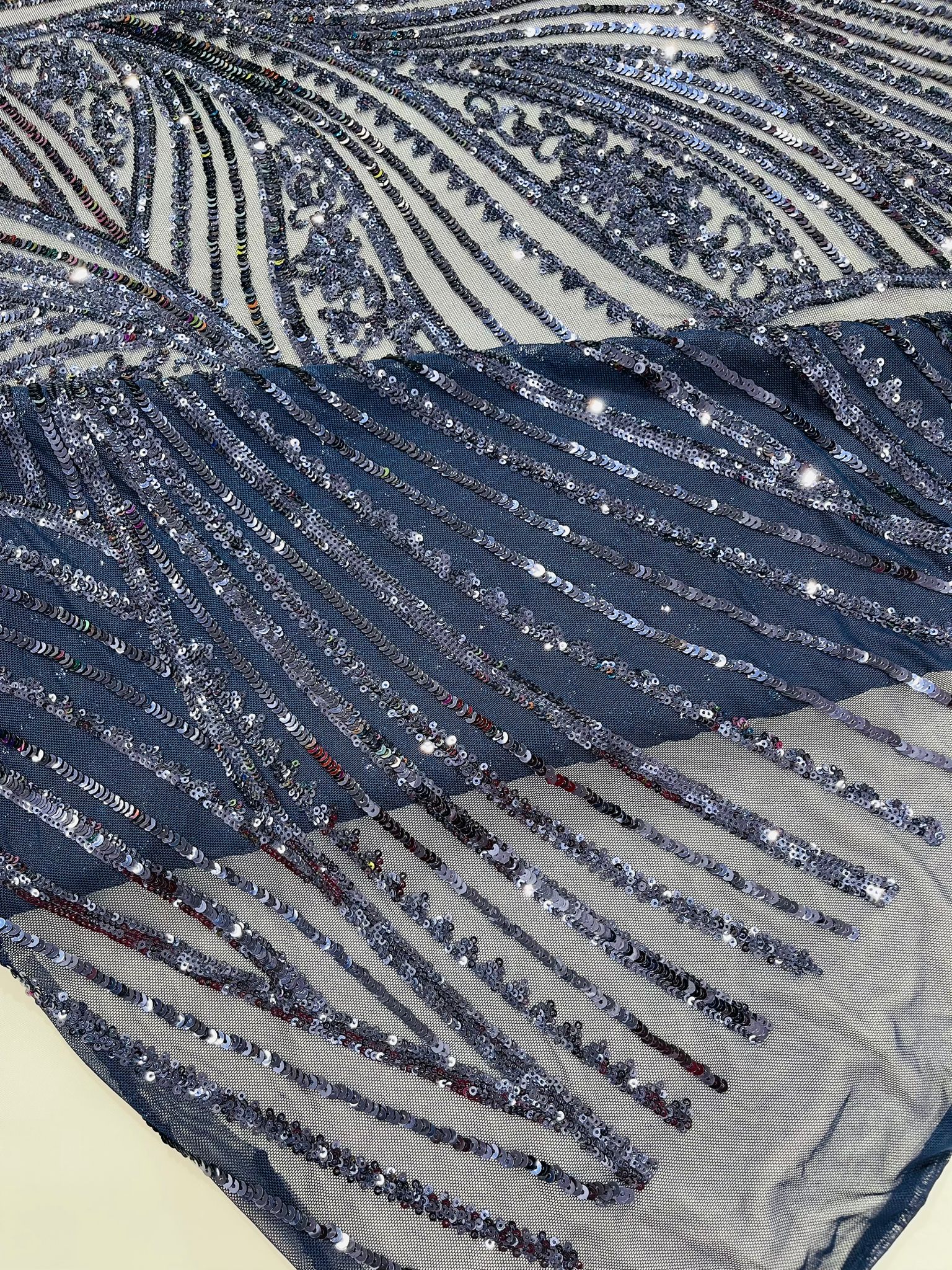 Geometric Feather wing shiny sequin design on a 4 way stretch mesh Fabric-prom-sold by the yard.