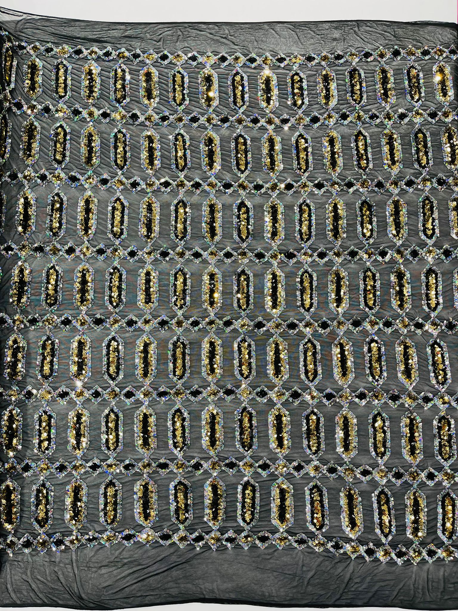 Jewel sequin design on a Cream 4 way stretch mesh fabric.