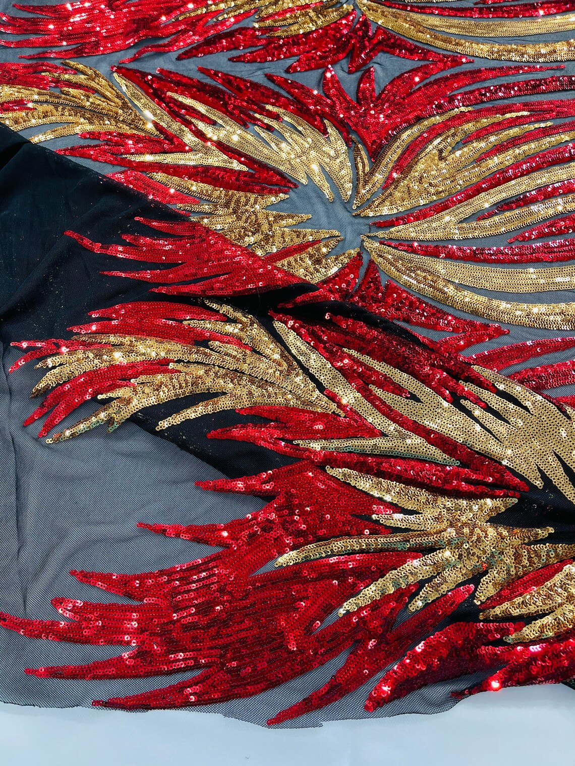 Wings Sequins Fabric - Red / Gold on Black - Large Feather Wings 4 Way Stretch Sequins Design By Yard