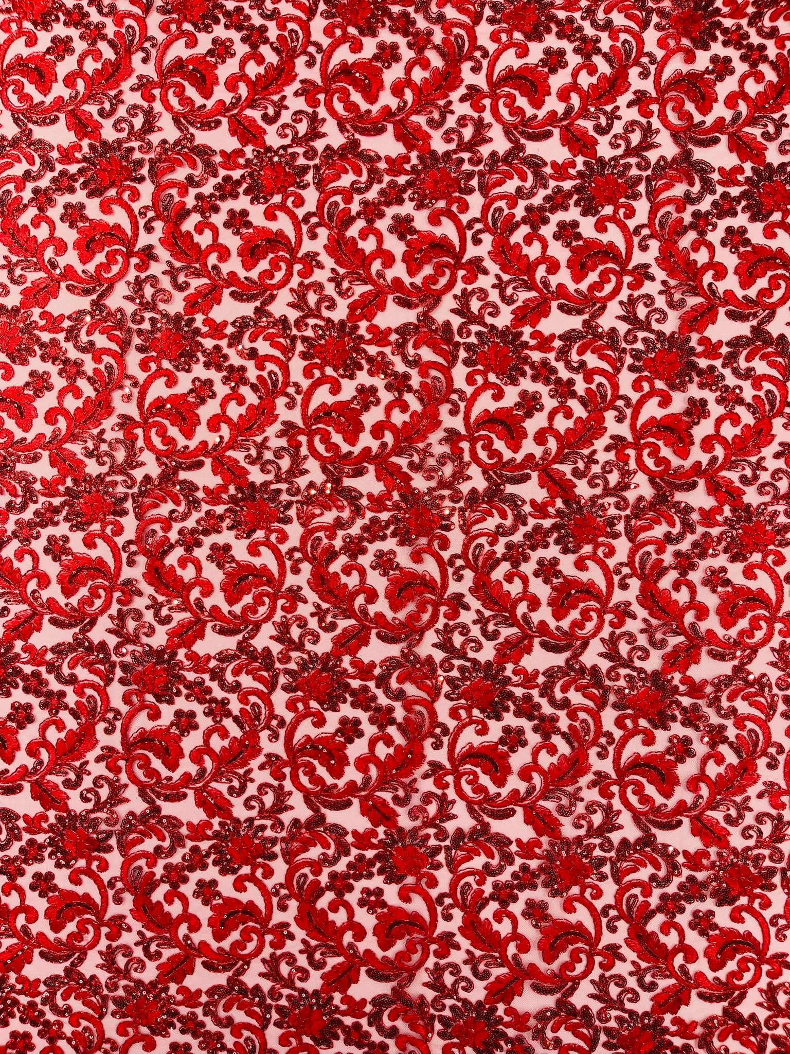 Metallic Corded Lace Design Embroidered With Holographic Sequins on a Mesh 54” Wide.