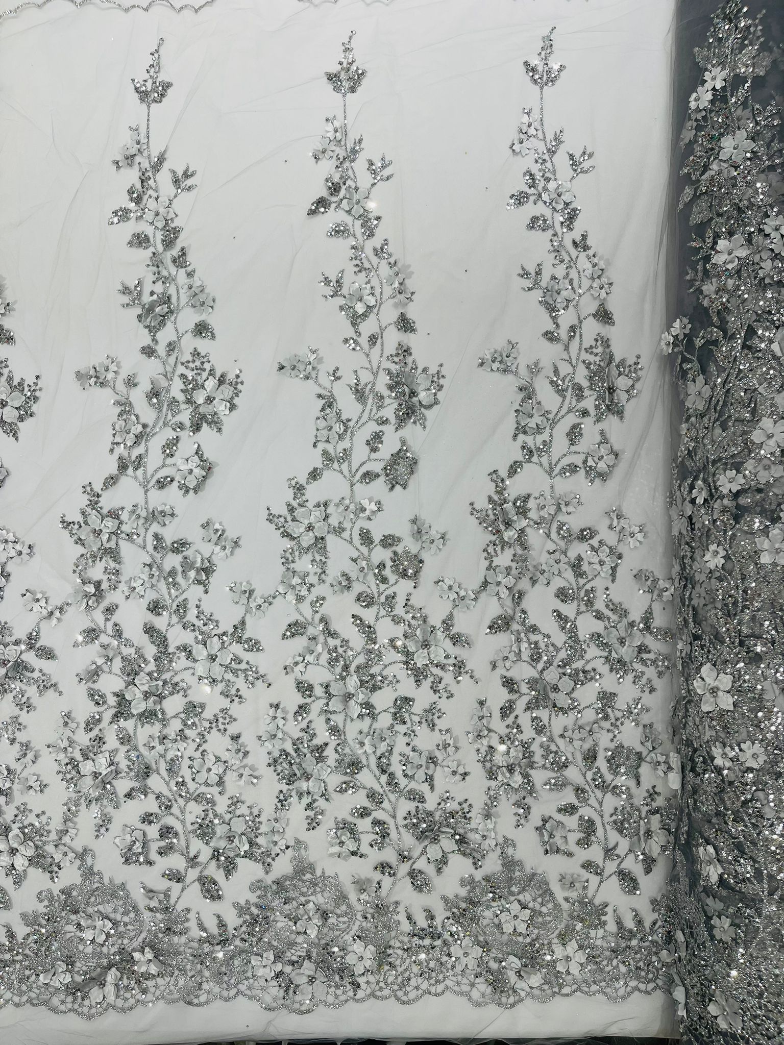 Princess Glitter 3d floral design embroidery with pearls in a mesh lace-sold by the yard.