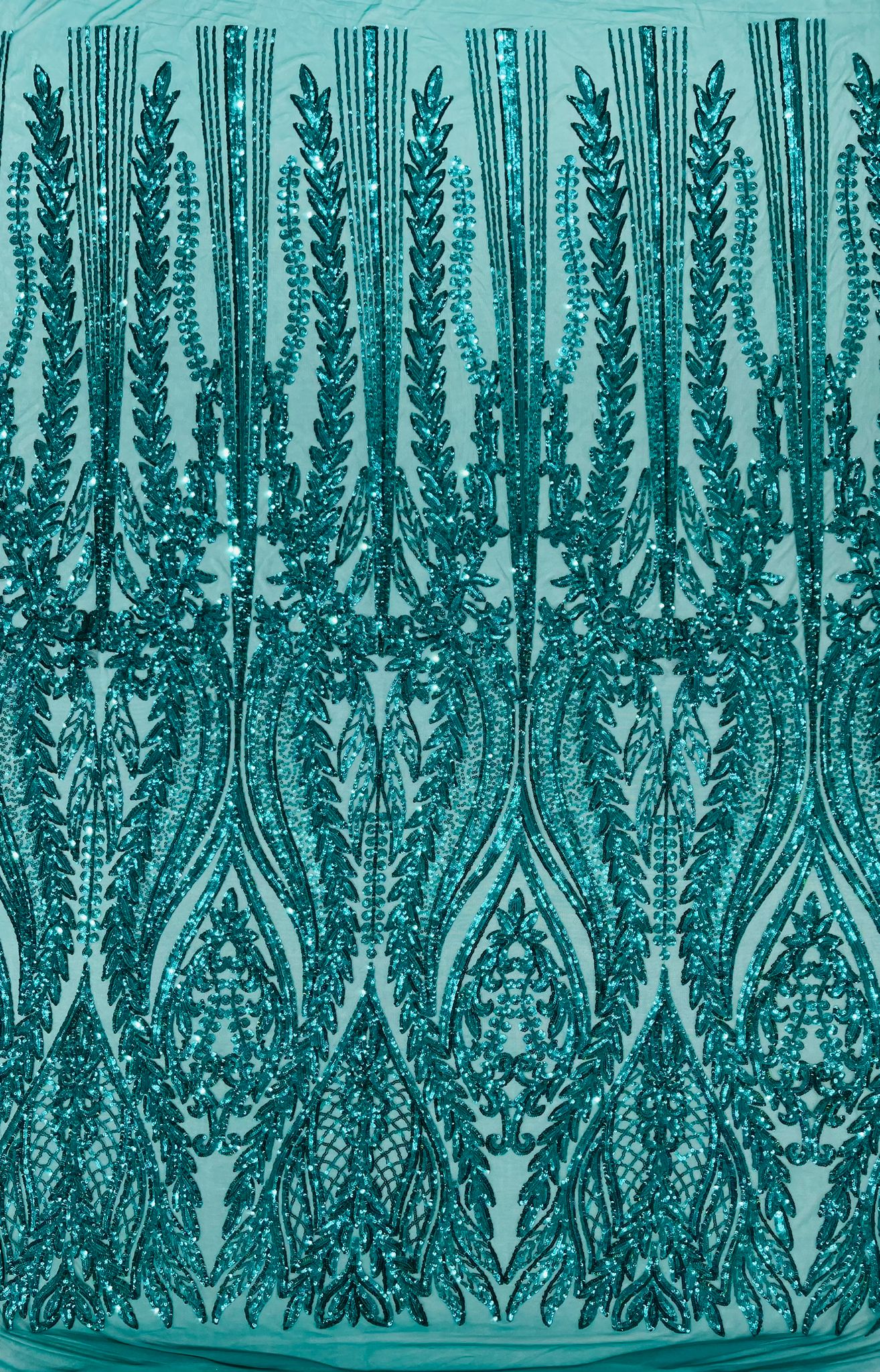 Damask design with sequins embroider on a 4 way stretch mesh fabric.