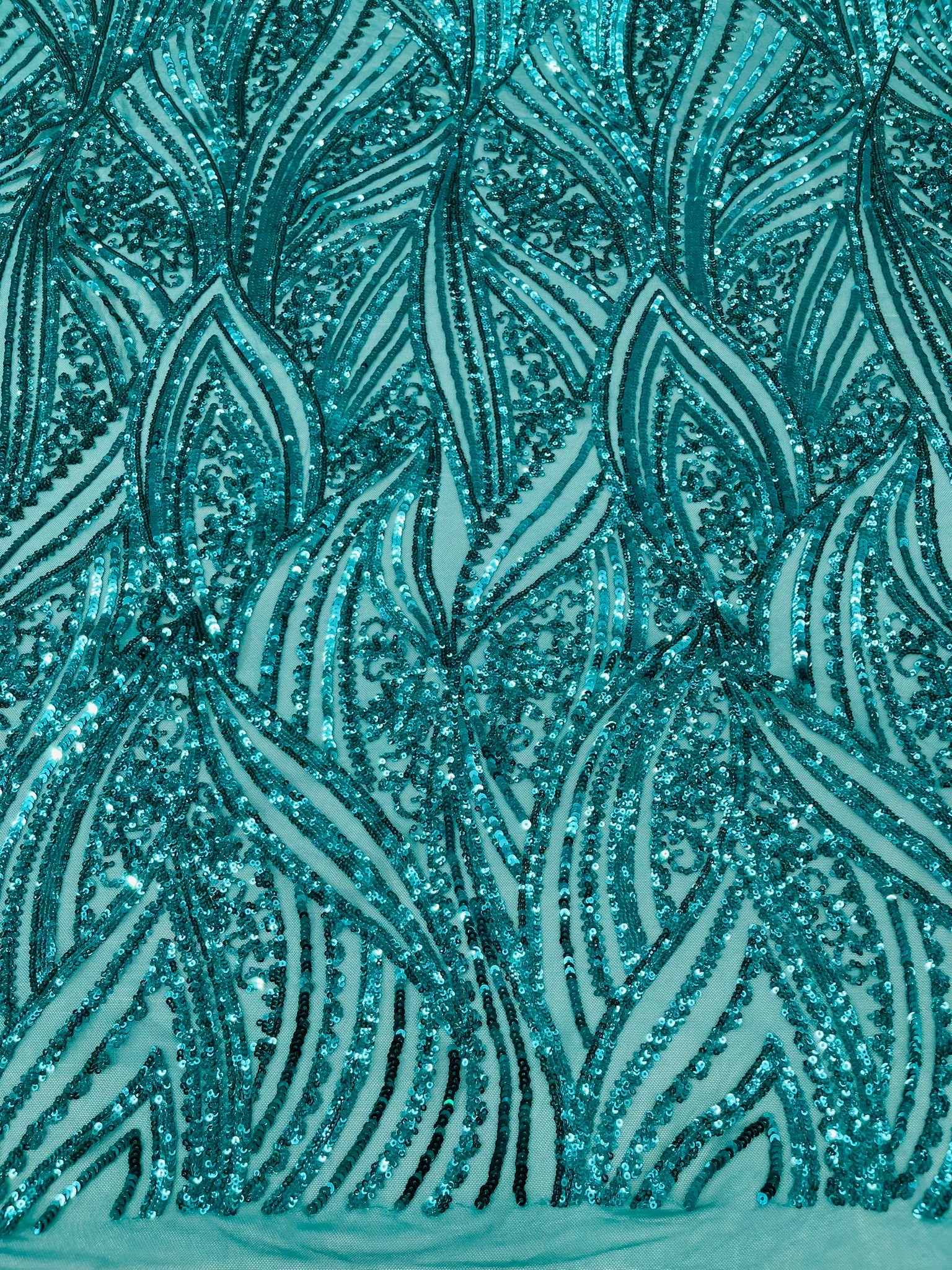 Geometric Feather wing shiny sequin design on a 4 way stretch mesh Fabric-prom-sold by the yard.