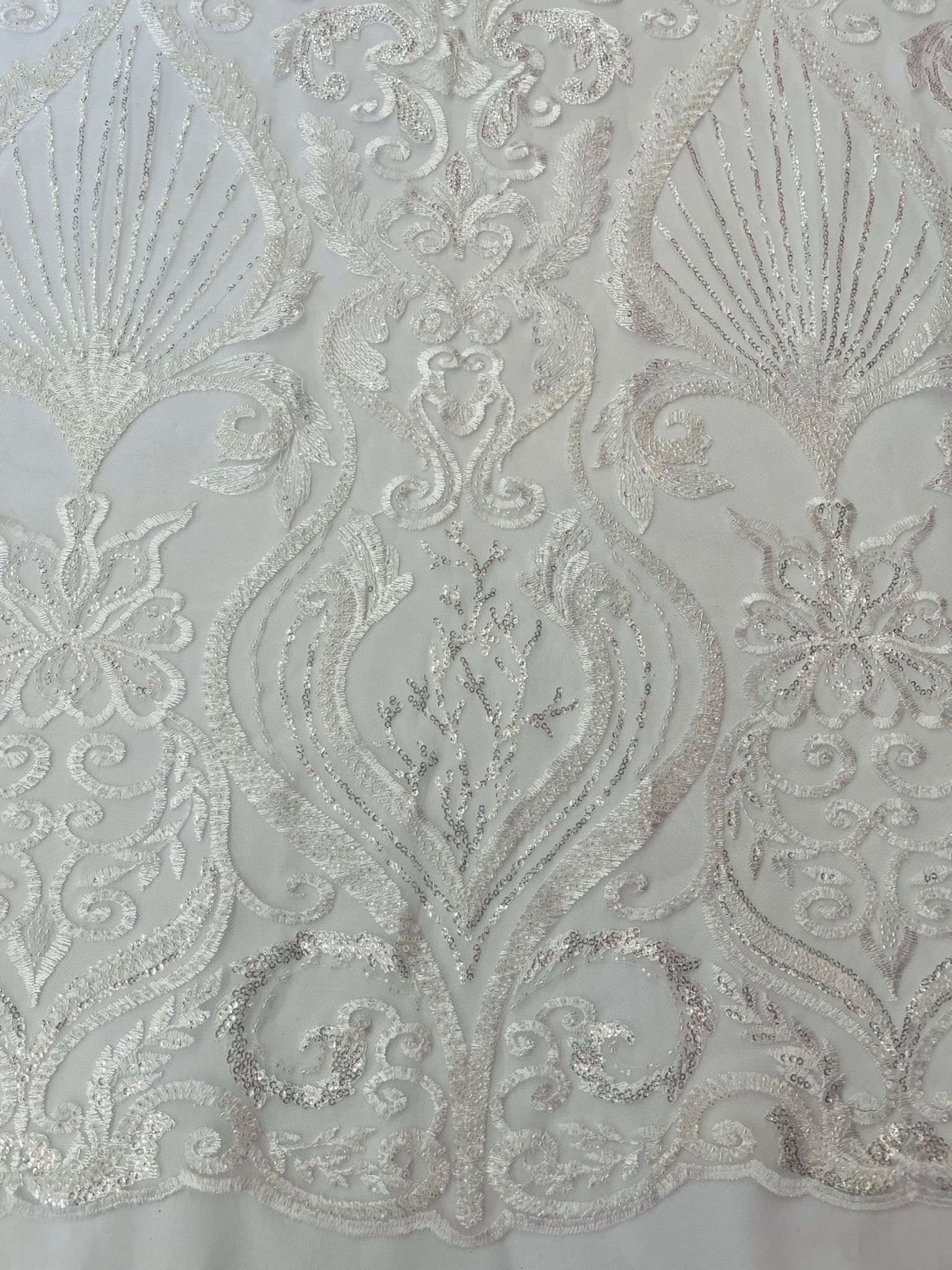 Floral damask embroider and heavy beaded on a mesh lace fabric/wedding Floral damask embroider and heavy beaded on a mesh lace fabric/wedding