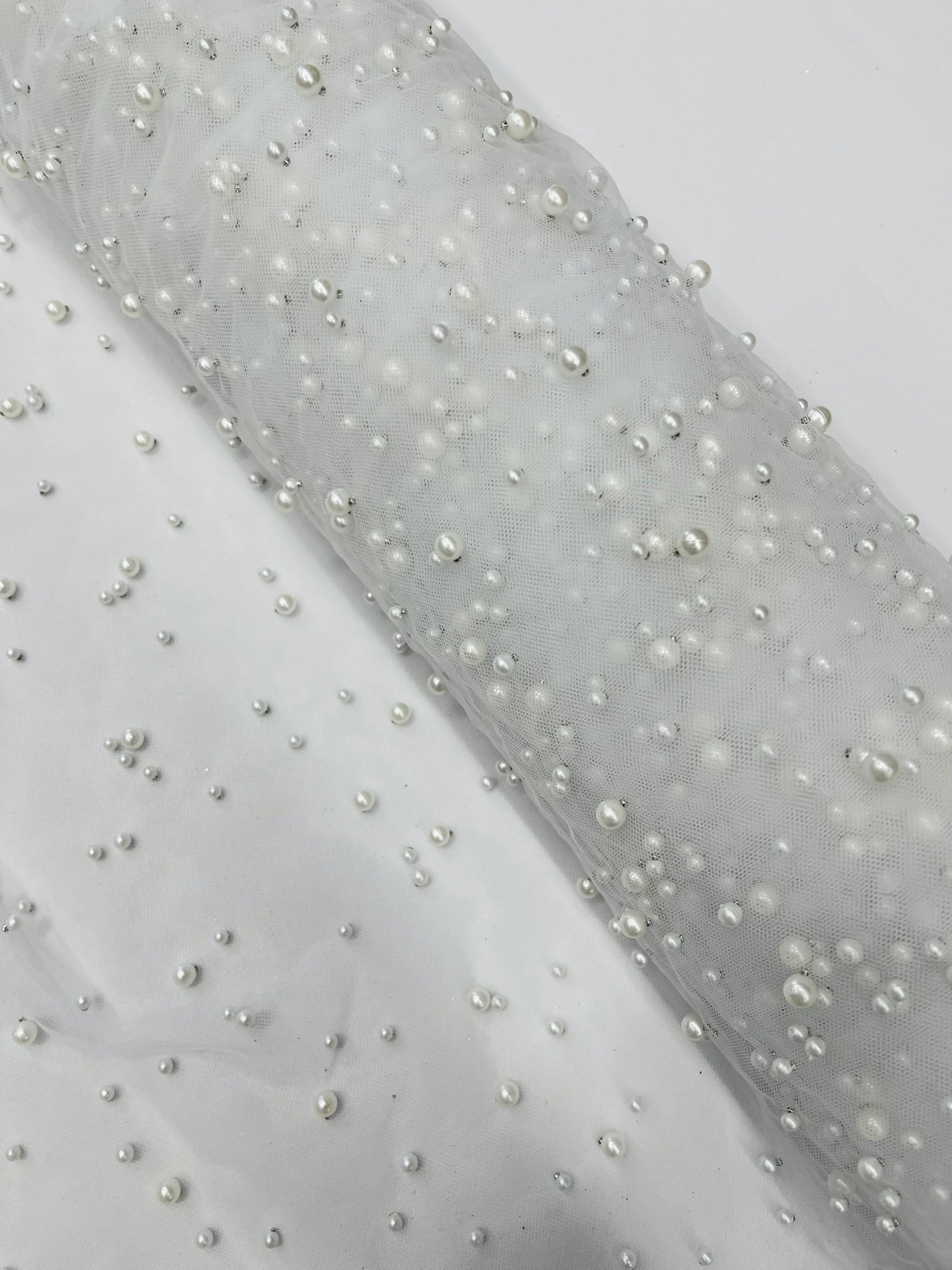Scattered Pearls Studded Mesh, 2-Way Stretch, Sold by the yard.