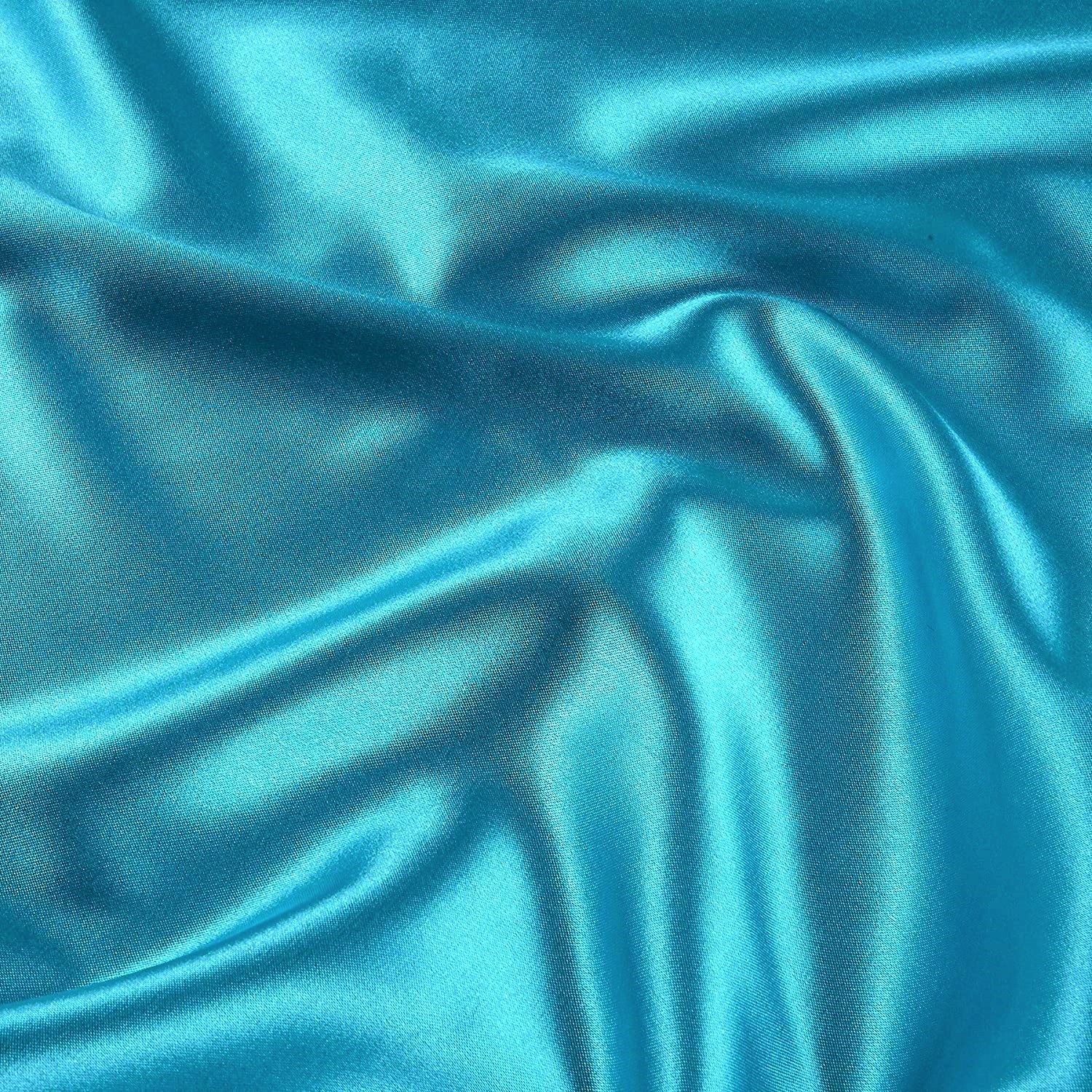 96 percent Polyester, 4% Spandex Light Weight Silky Stretch Charmeuse Satin Fabric by The Yard, 58-59" Wide.